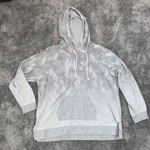 Maurice’s faded camo sweatshirt